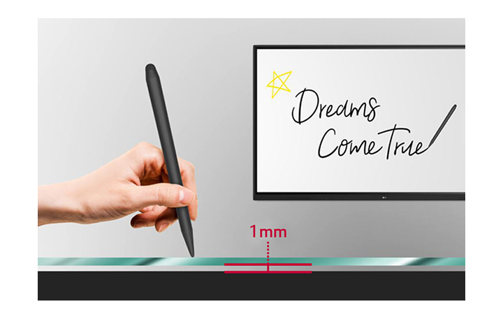 The user writes the words 'Dreams come true' with the electronic pen on the TR3DJ with 1mm gap between the screen and tempered glass.